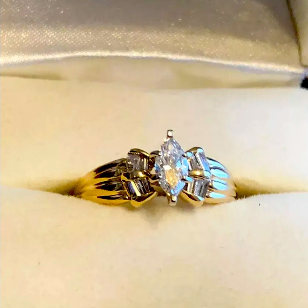 1 C.T.W. Marquise Diamond & Baguettes 14k Yellow Gold Ring. KAY JEWELERS
